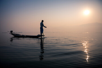 Wall Mural - Inle Lake Fisherman at sunrise (Intha Fisherman), near Nyaungshwe, Shan State, Myanmar (Burma)