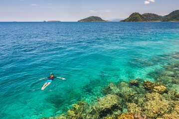 Wall Mural - Snorkeling at Twin Beach, a tropical, white sandy beach near Padang in West Sumatra, Indonesia, Asia, background with copy space