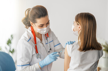 Wall Mural - Doctor vaccinating child