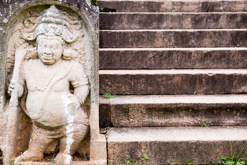 Wall Mural - Ancient City of Anuradhapura, statue at The Royal Palace, Cultural Triangle, Sri Lanka, Asia