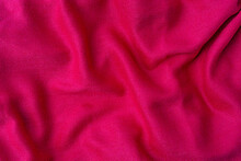 Crumpled Pink Fabric Texture Background Closeup