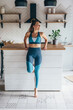 © undrey - Fit young athletic woman in the kitchen