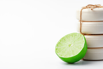 Wall Mural - Handmade soap with lime on a white background