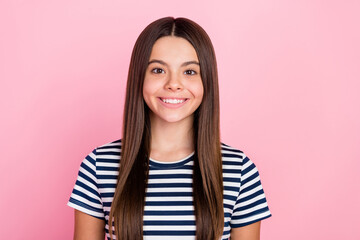 Wall Mural - Photo of funny sweet adorable girl dressed striped clothes smiling isolated pink color background