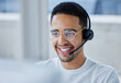 © Kirsten Davis/peopleimages.com - This client seems especially pleased with my work. Shot of a young businessman working at his desk in his office.