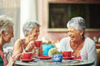 © Cecilie Skjold Wackerhausen/peopleimages.com - Lifelong friends catching up over coffee. Cropped shot of a group of senior female friends enjoying a lunch date.