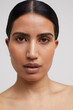 © Cultura Creative - Studio portrait of shirtless woman