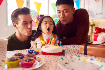 Wall Mural - Family With Two Dads Celebrating Daughter's Birthday At Home With Cake And Party