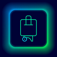 Sticker - Glowing neon line Suitcase for travel icon isolated on black background. Traveling baggage sign. Travel luggage icon. Colorful outline concept. Vector