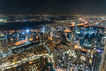 Canvas Print - Dubai United Arab Emirates  December 14 2021 the people visiting the 24th and 25th floor of Burj Khalifa at night and shopping souvenirs at the shop