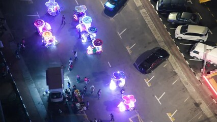 Canvas Print - Malacca, Malaysia - December 29, 2019: Melaka famous colorful rickshaws at night, overhead aerial view