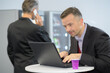 © auremar - businessman working while having a coffee break