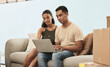 © Siphosethu F/peopleimages.com - Curiosity is human nature. Shot of a couple using a laptop at home.