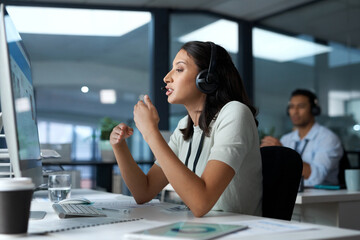 Aufkleber - Hang in there, help is on the way. Shot of a young woman using a headset and computer in a modern office.