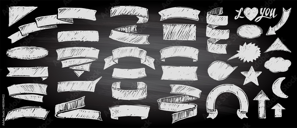 Assorted chalk style ribbons and elements set on a chalkboard ...