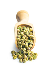 Canvas Print - Dried green peppercorn. Dry green pepper spice in scoop isolated on white table.