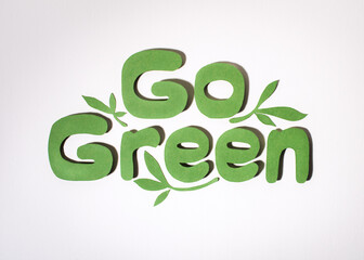 Go Green paper cut lettering. Environment day concept.