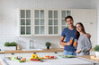 © BestForYou - Portrait of young couple in the kitchen with carrot juice. Healthy eating