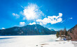Beautiful panorama view on alps mountains and frozen lake in Tirol, Tyrol, Austria.