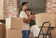 © Siphosethu F/peopleimages.com - Lets, stay together. Shot of a young couple hugging in to their new home.