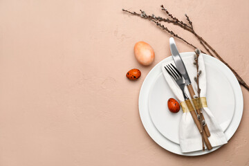 Stylish Easter table setting on beige background