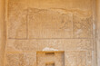 hieroglyph on the wall of the temple near Giza pyramids in Giza,
