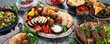 © bit24 - Arabic food assortment on dark background.