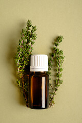 Canvas Print - Thyme Essential Oil Bottle with Thyme Bunch