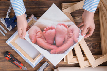the master demonstrates a photo printed on canvas and stretched on a stretcher.