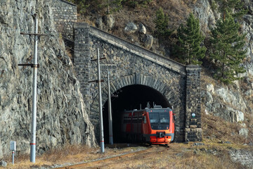 Wall Mural - Tourist train in the tunnel of the Circum-Baikal Railway