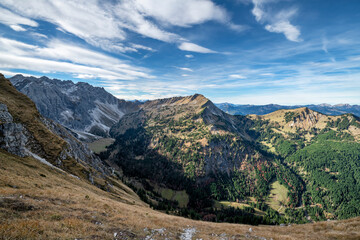 Wall Mural - Beautiful alpine landscape with rocky mountains, hills and forest at a sunny day in the Allgau Alps near Oberstdorf. Bavaria, Germany, Europe