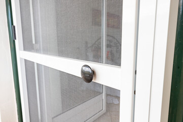 mosquito net on the door. Protection from blood-sucking insects in the summer