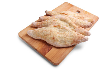 Traditional iraqi bread on a wooden tray