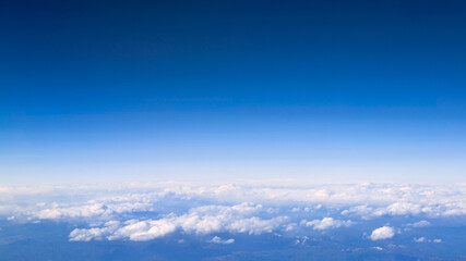 Wall Mural - Beautiful cloudscape with blue sky and to copy space up for promotional text.