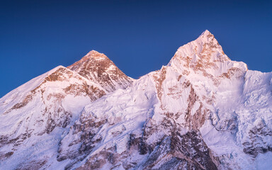 Wall Mural - view to peaks nuptse and everest under blue sky after sunset in nepal