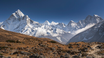 Wall Mural - panorama of stones and mountains under blue sky in nepal