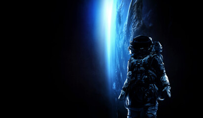 Wall Mural - Astronaut at spacewalk . Mixed media