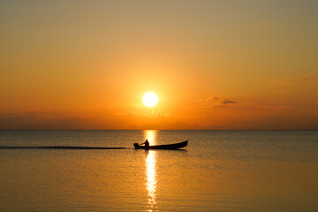 Poster - silhouette of a fishing boat in the lake