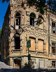 Wall Mural - Rostov-on-Don, Russia, September 12, 2019. Facade old abandoned building of monument of architecture after fire. Building is on corner of Cathedral Lane and Donskoy Street in city of Rostov-on-Don.