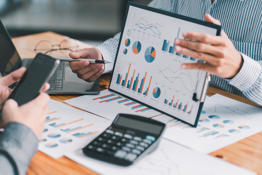 Finance manager meeting discussing company growth project success financial statistics, professional investor working start up project for strategy plan with document.