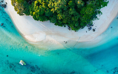 top view of white sand beach tropical with seashore as the island in a coral reef ,blue and turquois