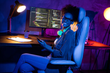 Photo of lady freelancer sit desk use smart gadget chatting screen web improving gaming in evening late workplace workstation