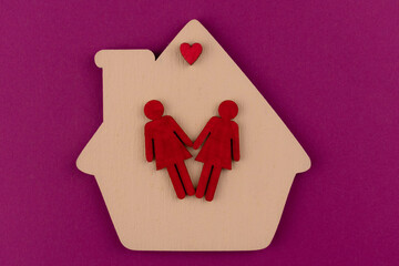 House symbol and same-sex couple.Same-sex relationship concept.