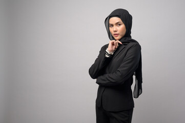 Wall Mural - Beautiful business woman with hijab portrait on white background