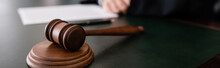 Wooden Gavel On Desk Near Cropped Judge On Blurred Background, Banner