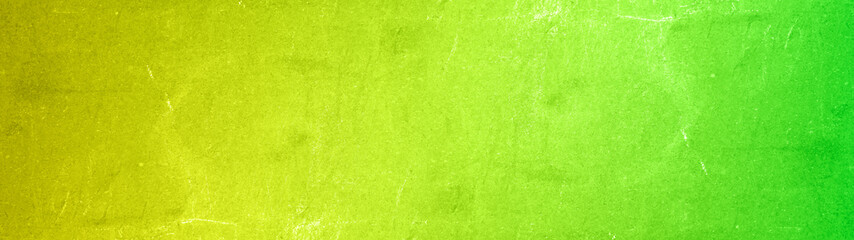Wall Mural - Abstract yellow neon green colored stone concrete cement scratched weathered grunge wall or floor texture background panorama banner long