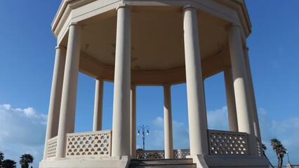 Wall Mural - The Gazebo, a round temple with a dome supported by circular columns. The Belvedere is located in the center of the beautiful Mascagni terrace on the seafront of Livorno, Tuscany, Italy.