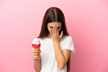 Poster - Little girl with a cornet ice cream over isolated pink background with tired and sick expression