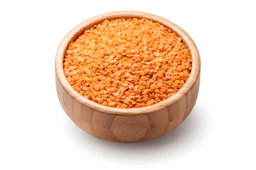 Wall Mural - Red lentils in wooden bowl isolated on white background.