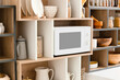 © Pixel-Shot - Shelf unit with kitchenware and modern microwave oven